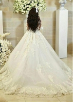 Fascinating Tulle Bateau Neckline Ball Gown Wedding Dress With Lace Appliques