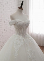 Glamorous Tulle Off-the-shoulder Neckline Ball Gown Wedding Dress With Lace Appliques & Beadings