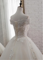 Fascinating Tulle Off-the-shoulder Neckline Ball Gown Wedding Dress With Beaded Lace Appliques