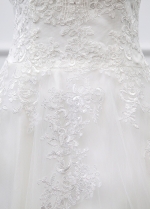 Graceful Tulle Sheer Jewel Neckline A-line Wedding Dress With Lace Appliques