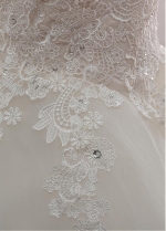 Fascinating Tulle Off-the-shoulder Neckline Ball Gown Wedding Dress With Beaded Lace Appliques